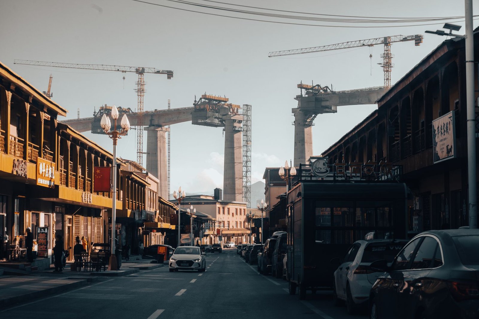 Tanahun suspension bridges reconstruction, bridge construction with cranes in Nepal